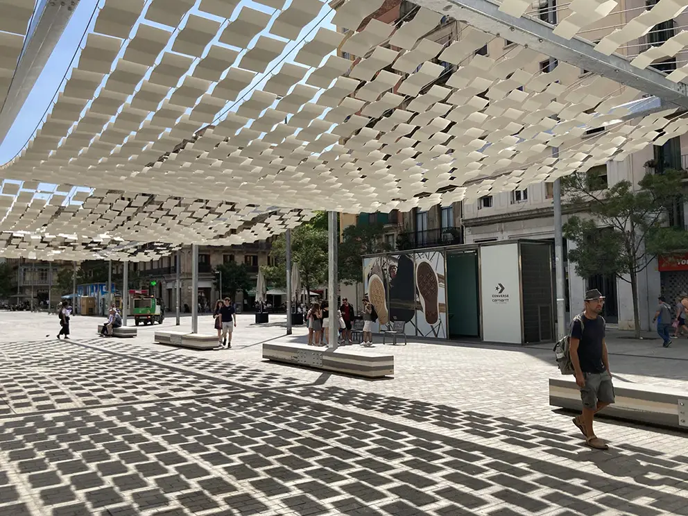 Kinetic cladding pergola