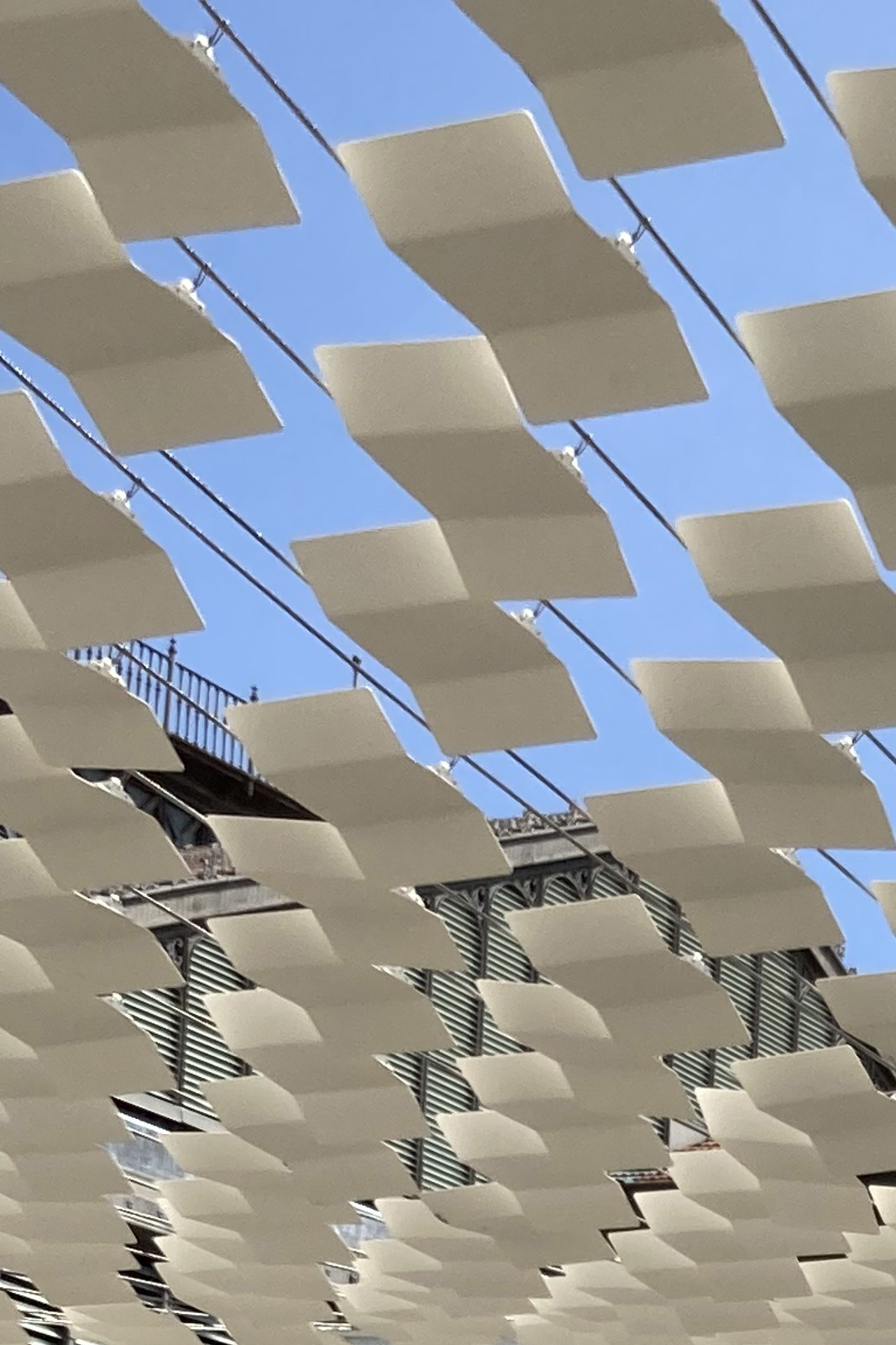 Kinetic cladding pergola